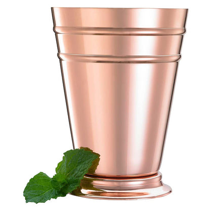  A Copper Plated Barfly Deluxe Julep Cup 13.5oz with a sprig of mint on a white background.