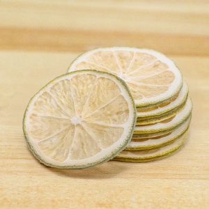 Freeze Dried Lemon Wheel Garnish on a wood